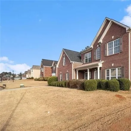 Buy this 5 bed house on 1348 Fall River Drive Southeast in Rockdale County, GA 30013