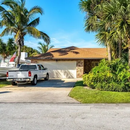 Buy this 3 bed house on 310 Spoonbill Ln in Melbourne Beach, Florida