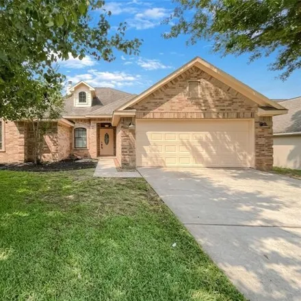 Buy this 4 bed house on 13655 Leafy Arbor Dr in Montgomery, Texas