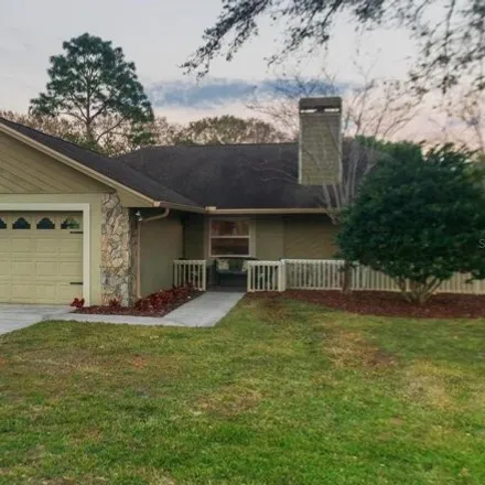 Rent this 4 bed house on Colony Park Drive in Lakeland Highlands, Polk County