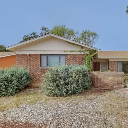 Buy this 3 bed house on 3745 Big Bend Road Northeast in Tramway Highpoint (HOA), Albuquerque