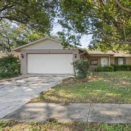 Buy this 3 bed house on 5780 Corkwood Court in Holiday, FL 34690