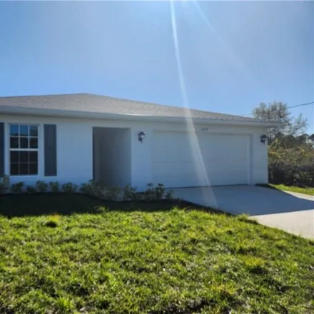 Rent this 3 bed house on 3201 61st Street West in Lehigh Acres, FL 33971