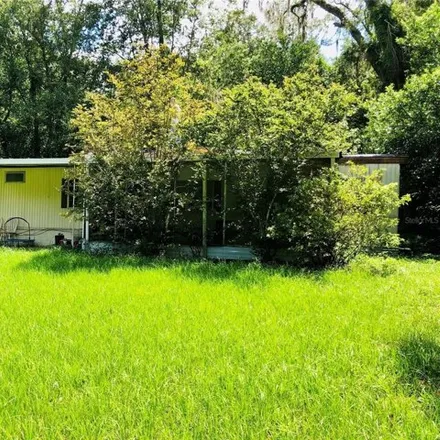 Buy this studio apartment on 9625 Northeast 28th Avenue in Marion County, FL 32617