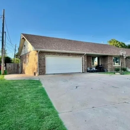 Buy this 4 bed house on 1121 Shady Lane in Wellington, KS 67152