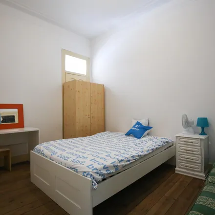 Rent this 4 bed room on Rua António Pedro 109 in 1150-045 Lisbon, Portugal