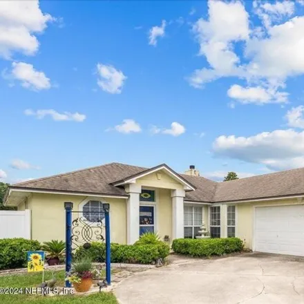 Buy this 3 bed house on 2904 Russell Oaks Drive in Clay County, FL 32043