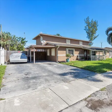 Buy this 5 bed house on 309 Northwest 2nd Court in College Park, Deerfield Beach