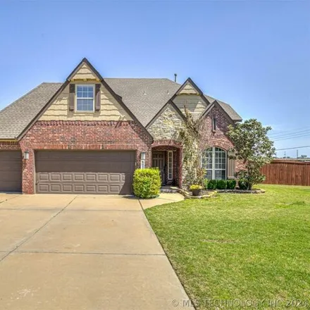 Buy this 4 bed house on 5033 South 165th East Avenue in Tulsa, OK 74134