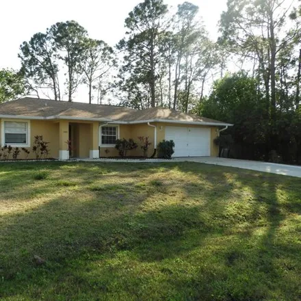 Rent this 3 bed house on 1380 Rila St SE in Palm Bay, Florida