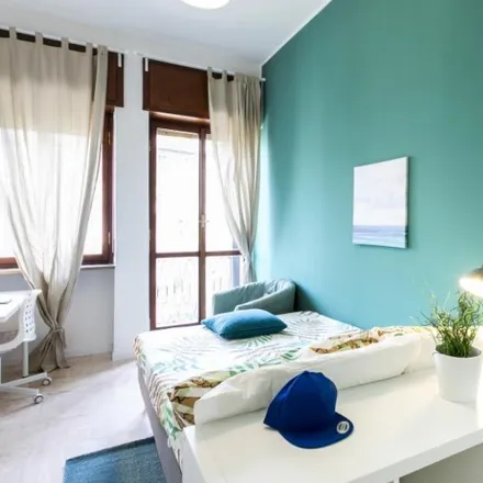 Rent this 7 bed room on Gattullo in Viale Col di Lana, 20136 Milan MI