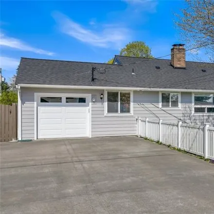 Buy this 4 bed house on 648 South 143rd Place in Burien, WA 98168