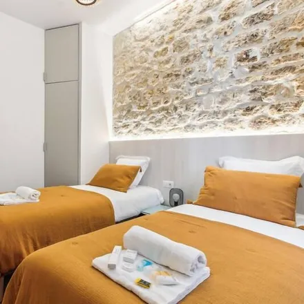 Rent this 2 bed apartment on Square de l'Île-de-France in 75004 Paris, France