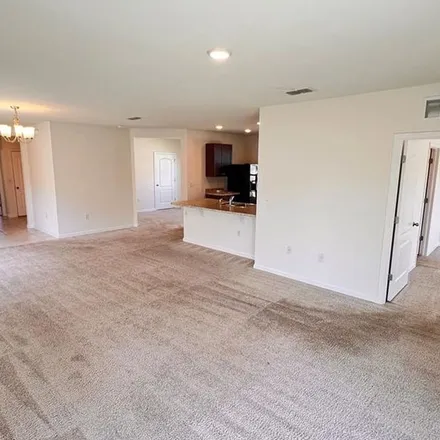 Rent this 3 bed apartment on 557 Armoyan Way in Coastal Woods, New Smyrna Beach