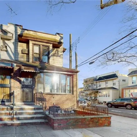 Buy this 3 bed house on 77-71 79th Street in New York, NY 11385