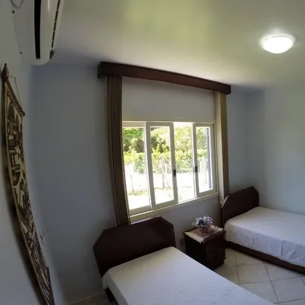 Rent this 3 bed house on Ponta das Canas in Florianópolis, Santa Catarina