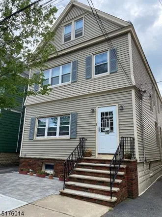 Buy this 5 bed townhouse on 174 West 49th Street in Bayonne, NJ 07002
