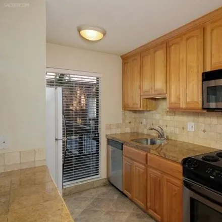 Buy this 2 bed condo on 810 Woodside Lane East in Sacramento County, CA 95825