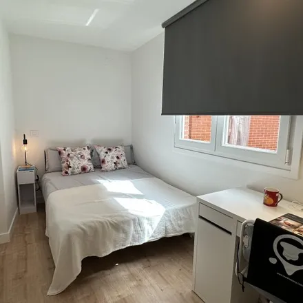 Rent this 6 bed room on Calle del Trébol in 28039 Madrid, Spain
