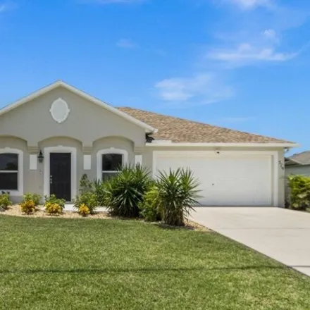Buy this 4 bed house on 575 Southwest Whitmore Drive in Port Saint Lucie, FL 34984