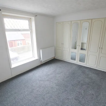 Rent this 3 bed townhouse on Milton Street Chippy in 4 Milton Street, Accrington