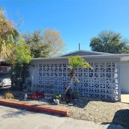 Buy this 4 bed house on 513 North Saturn Avenue in Clearwater, FL 33755