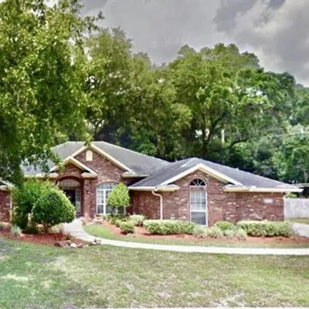 Rent this 4 bed house on 2511 Woodfern Lane in Plummers, Jacksonville