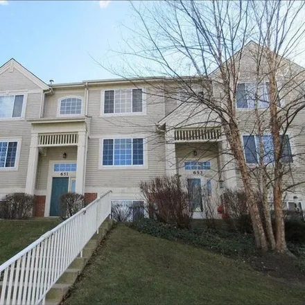 Rent this 3 bed townhouse on 651 Cary Woods Cir Unit 651 in Cary, Illinois