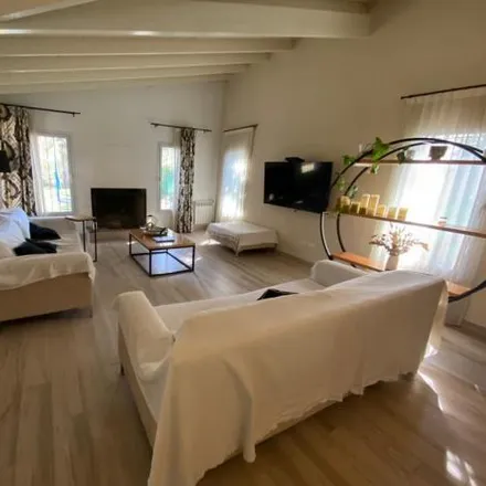 Buy this 3 bed house on De Los Baqueanos in Villa Udaondo, B1715 CBC Villa Udaondo