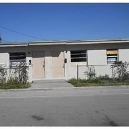 Rent this 2 bed house on 2711 Northwest 6th Court in Washington Park, Broward County