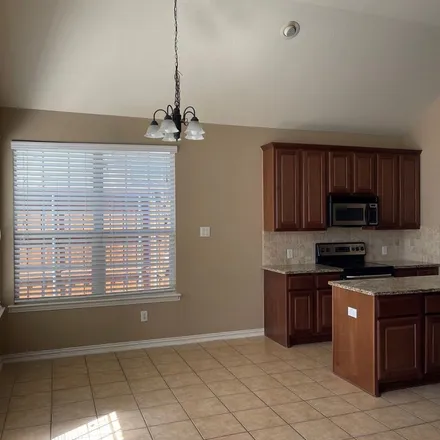Rent this 4 bed apartment on 2626 Wilderness Drive in Little Elm, TX 75068