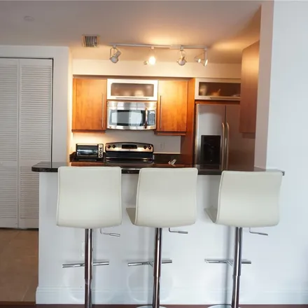 Rent this 2 bed condo on 7-Eleven in 1 West Flagler Street, Miami