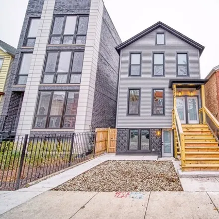 Rent this 3 bed house on 1513 West Erie Street in Chicago, IL 60612