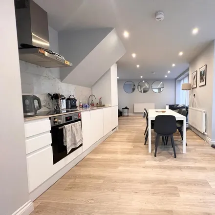 Rent this 4 bed house on S Ford Autos in 309-313 Sprowston Mews, London
