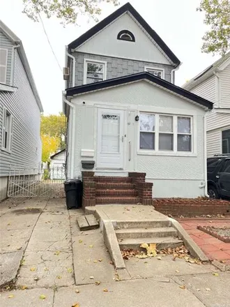 Rent this 3 bed house on 69-17 Olcott Street in New York, NY 11375