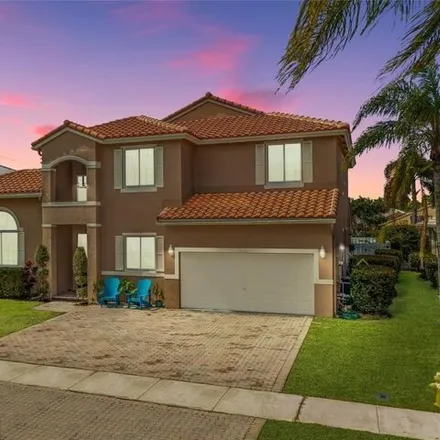 Buy this 6 bed house on 5686 Northwest 108th Way in Kensington Manor, Coral Springs