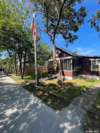 Rent this 3 bed house on 276 Cottage Walk in Village of Ocean Beach, Islip