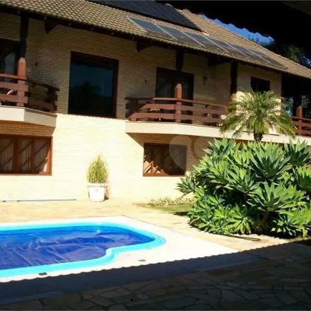 Buy this 4 bed house on Rua Santa Bertila Boscardin 220 in Santa Felicidade, Curitiba - PR