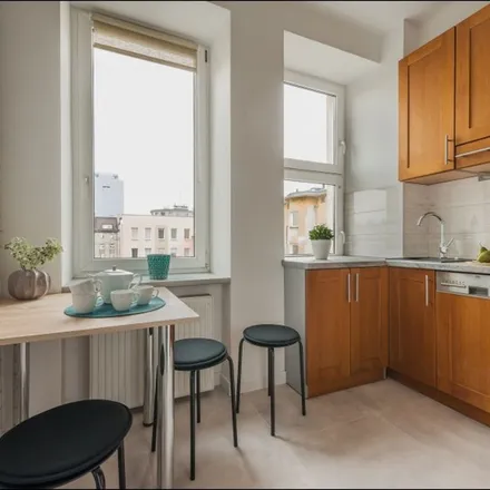 Rent this 2 bed apartment on Chmielna 73C in 00-801 Warsaw, Poland