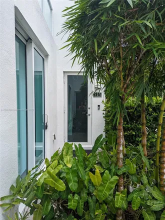 Rent this 3 bed townhouse on Tesla Supercharger in Northeast 7th Street, Fort Lauderdale