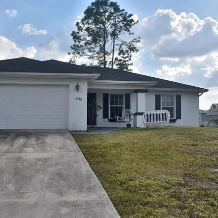 Buy this 3 bed house on 3669 4th Street Southwest in Lehigh Acres, FL 33976