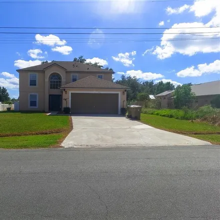 Buy this 4 bed house on 839 Nelson Drive in Poinciana, FL 34758