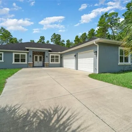 Buy this 5 bed house on 4558 Southwest 112th Street in Marion County, FL 34476