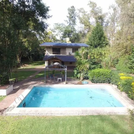 Buy this 4 bed house on unnamed road in Partido de José C. Paz, 1669 José C. Paz