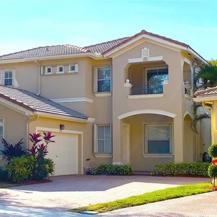 Rent this 4 bed house on 5830 Northwest 119th Drive in Heron Bay South, Coral Springs