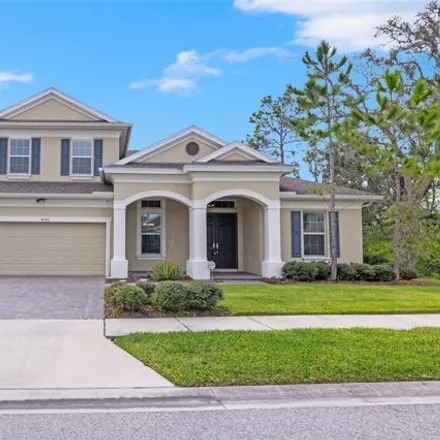 Buy this 5 bed house on Glade Wood Loop in Starkey Ranch, FL 34655