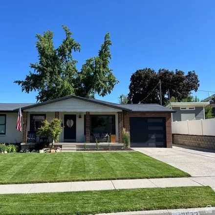 Buy this 4 bed house on 2573 6600 South in Cottonwood Heights, UT 84121