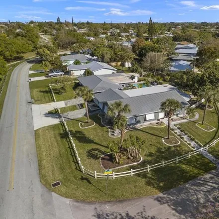 Buy this 4 bed house on 2373 Northeast 13th Court in Jensen Beach, FL 34957