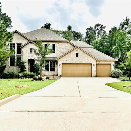 Buy this 5 bed house on 11009 Oak Cliff Court in Conroe, TX 77304