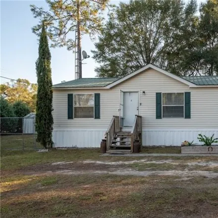 Buy this studio apartment on 6987 Southeast 80th Place in Gilchrist County, FL 32693